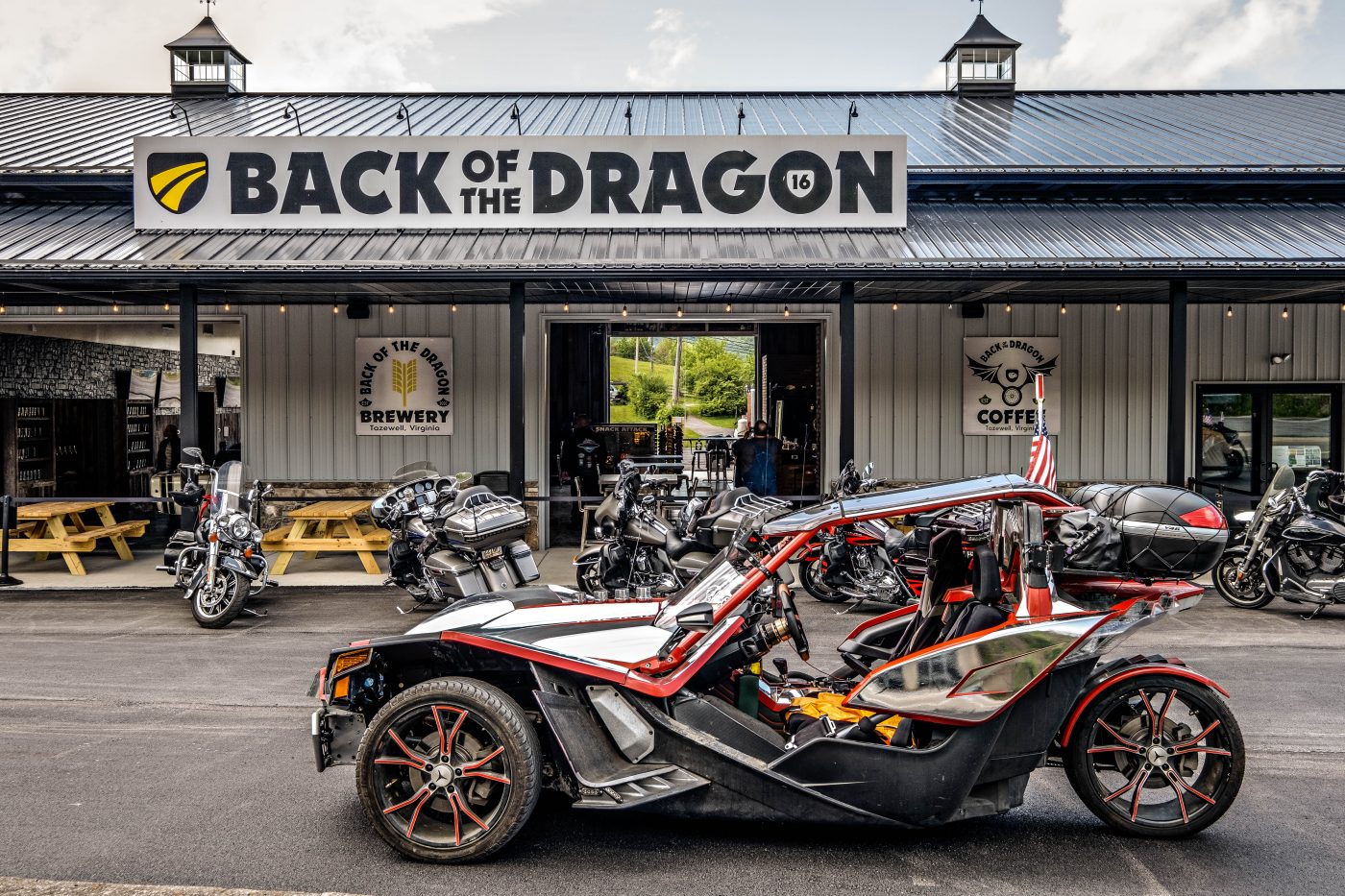 Sports car roads Virginia featuring a performance car driving Back of the Dragon near Tazewell